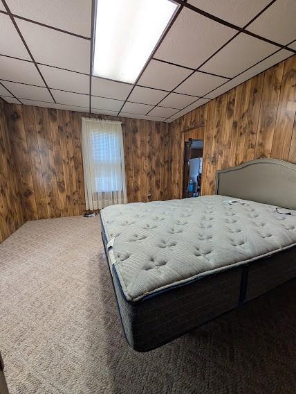 179 Main Street Petrolia, PA 16050 - Photo 23 of 41 a bedroom with a bed a chandelier and a window