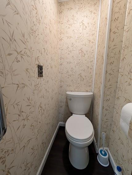179 Main Street Petrolia, PA 16050 - Photo 24 of 41 a white toilet sitting next to a shower curtain