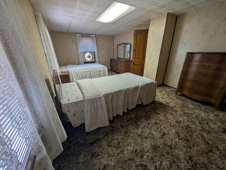 179 Main Street Petrolia, PA 16050 - Photo 33 of 41 a bed room with a bed and a mirror