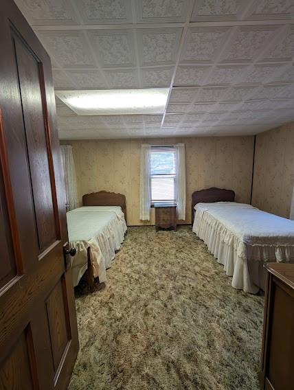 179 Main Street Petrolia, PA 16050 - Photo 34 of 41 a bedroom with a bed and a mirror