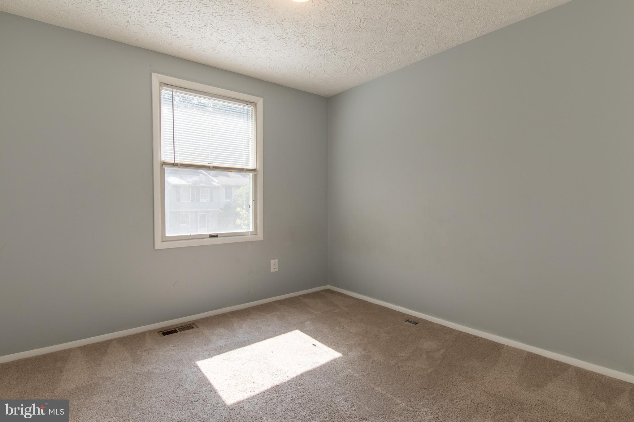 8334 Windfall Road Springfield, VA 22153 - Photo 15 of 16 an empty room with a window