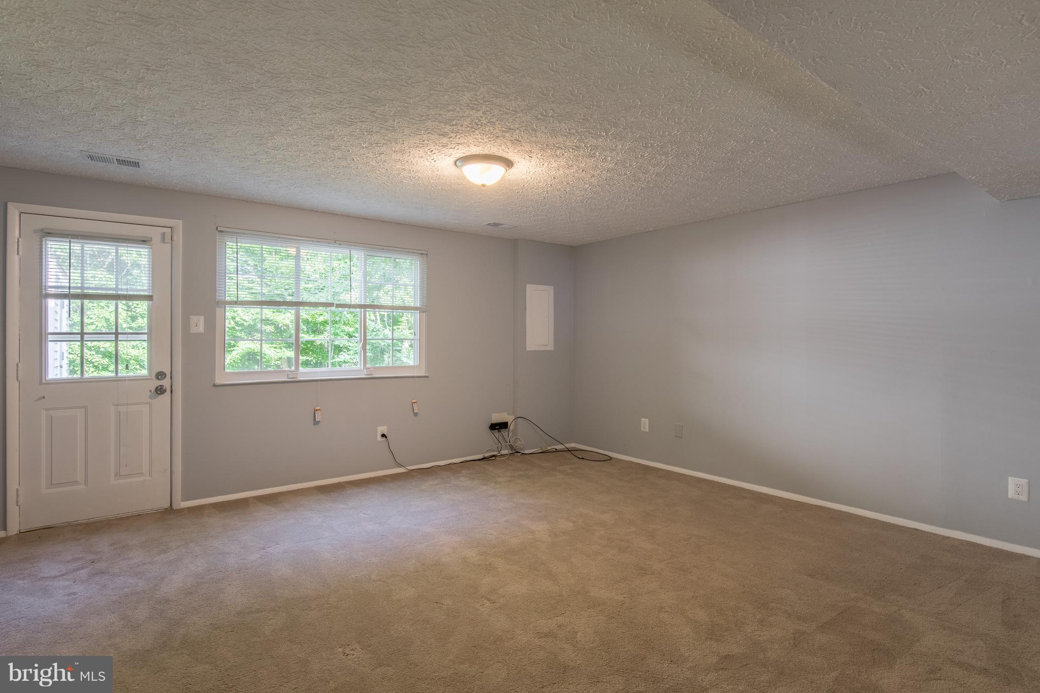 8334 Windfall Road Springfield, VA 22153 - Photo 8 of 16 an empty room with windows