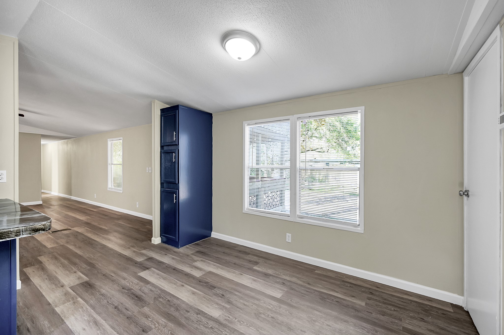 13219 13th Street, Unit A Splendora, TX 77372 - Photo 12 of 19 Your kitchen is ready for you to make your favorite meals as you gaze out into the wooded area behind it.