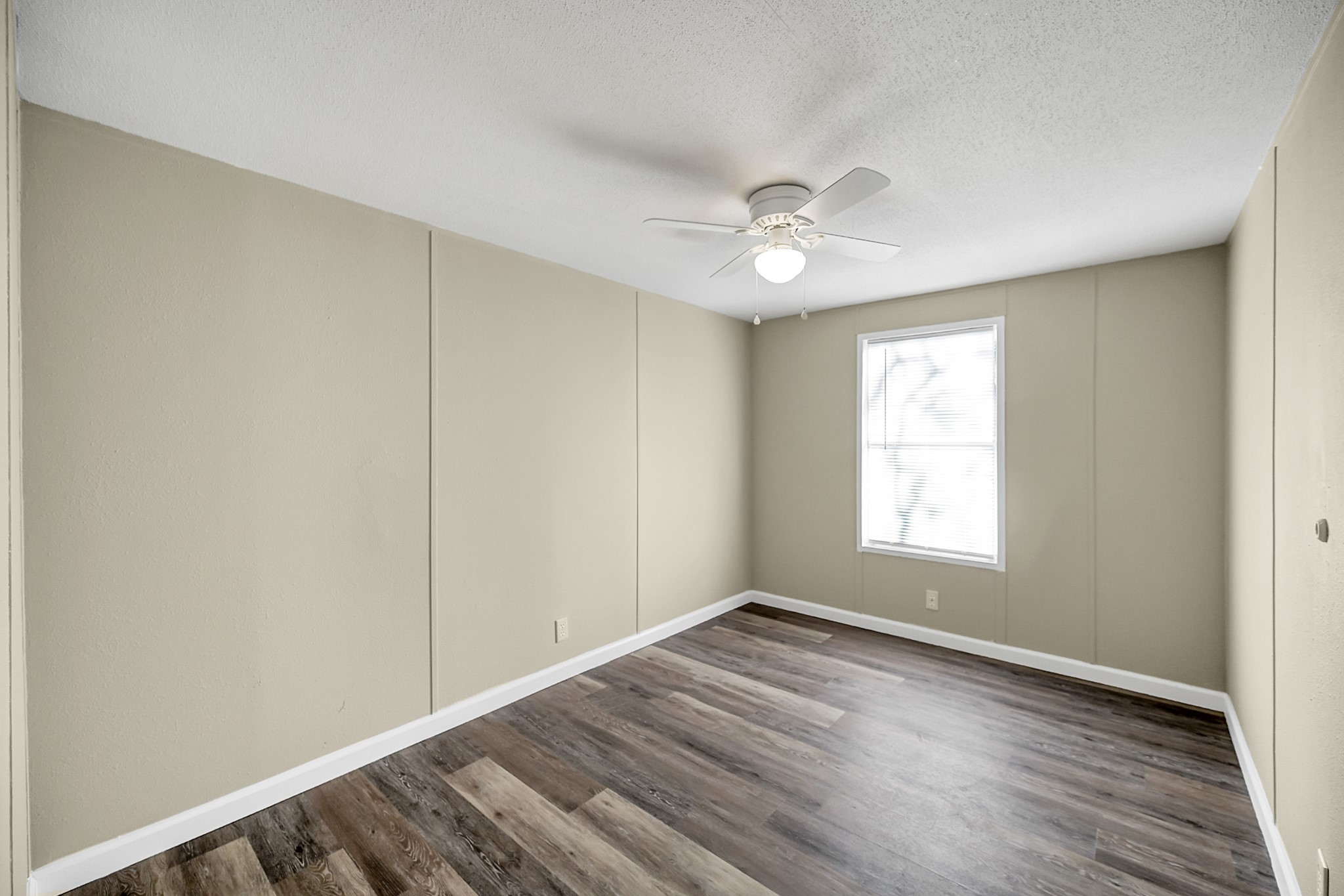 13219 13th Street, Unit A Splendora, TX 77372 - Photo 8 of 19 Here is bedroom number one. Both have closets ready to store all of your things and beautiful natural light streaming in.