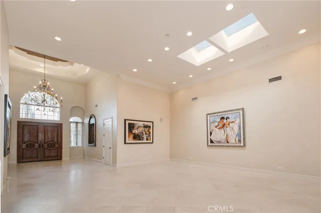 a view of a hallway with an entryway