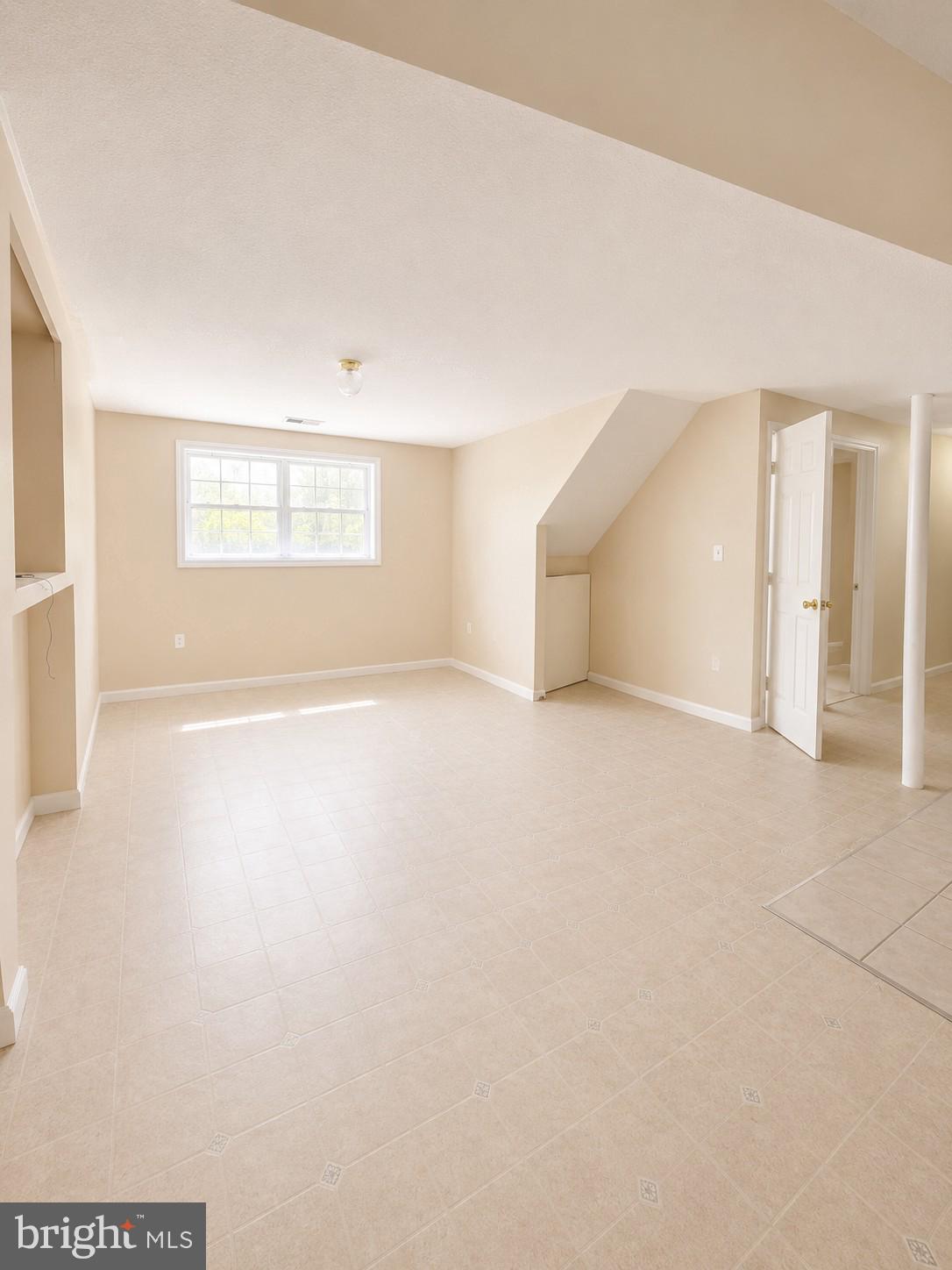 6204 Cipriano Road Lanham, MD 20706 - Photo 14 of 19 an empty room with windows