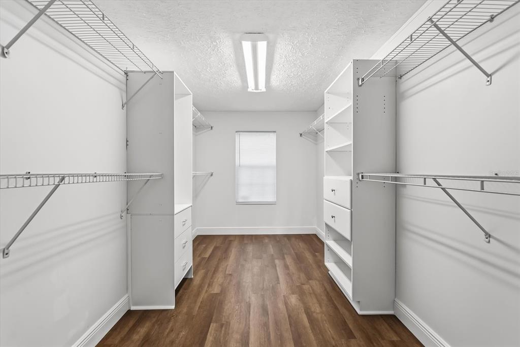 1785 Marsh Way Geneva, FL 32732 - Photo 33 of 40 a view of hallway with wooden floor and window