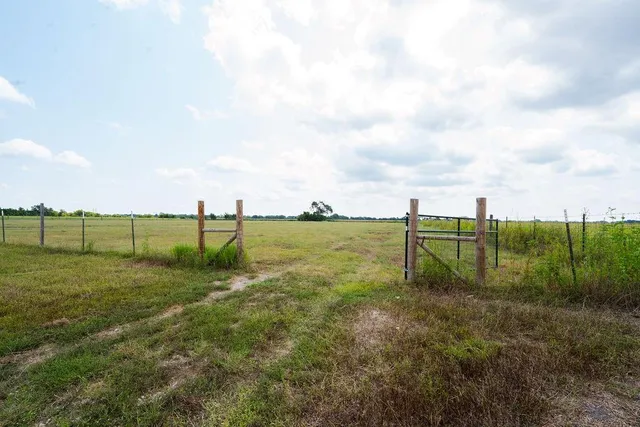 a view of a golf course with a garden