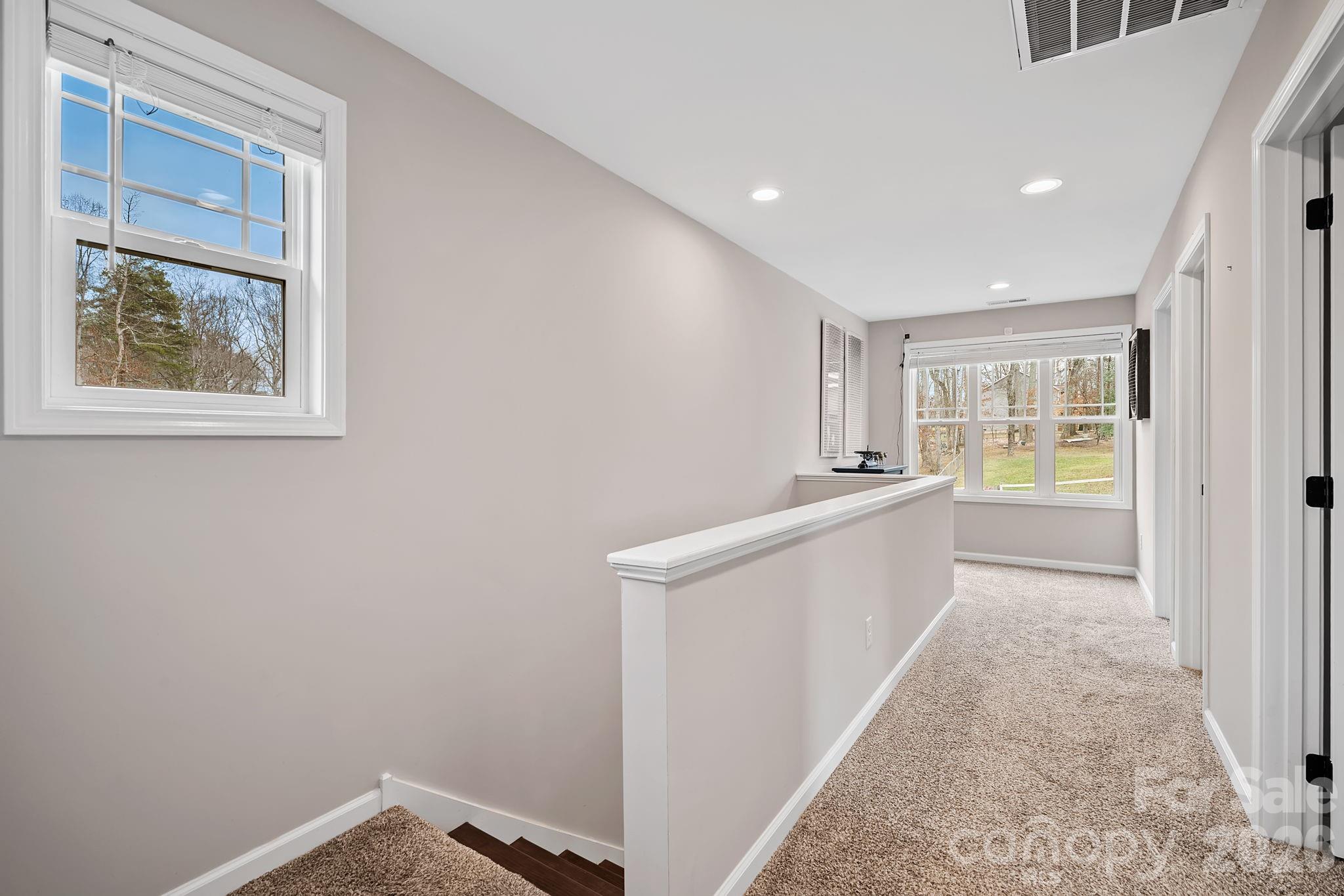 57 Parrot Road Candler, NC 28715 - Photo 17 of 44 a view of hallway with window