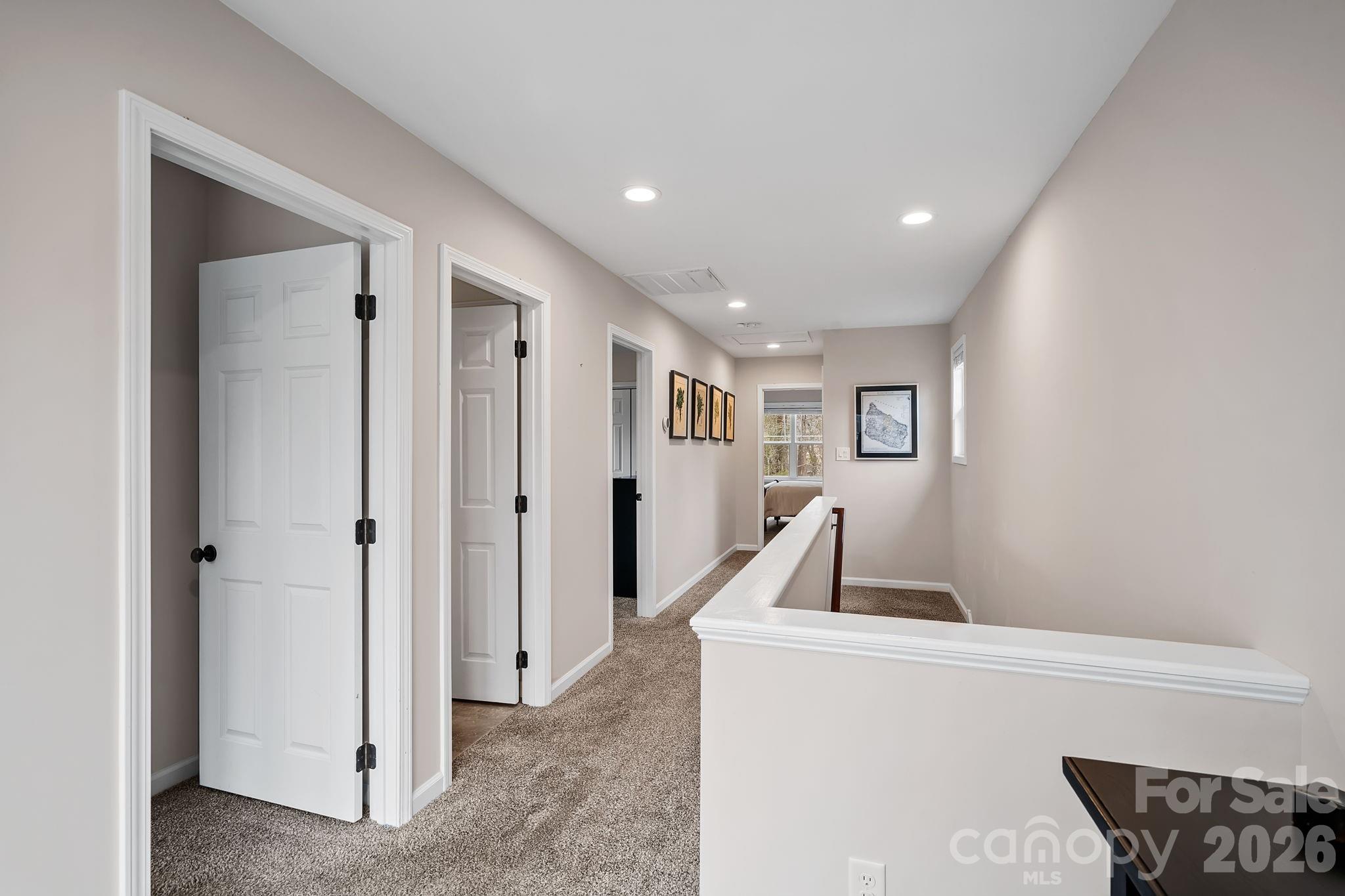 57 Parrot Road Candler, NC 28715 - Photo 18 of 44 a hallway with a white furniture