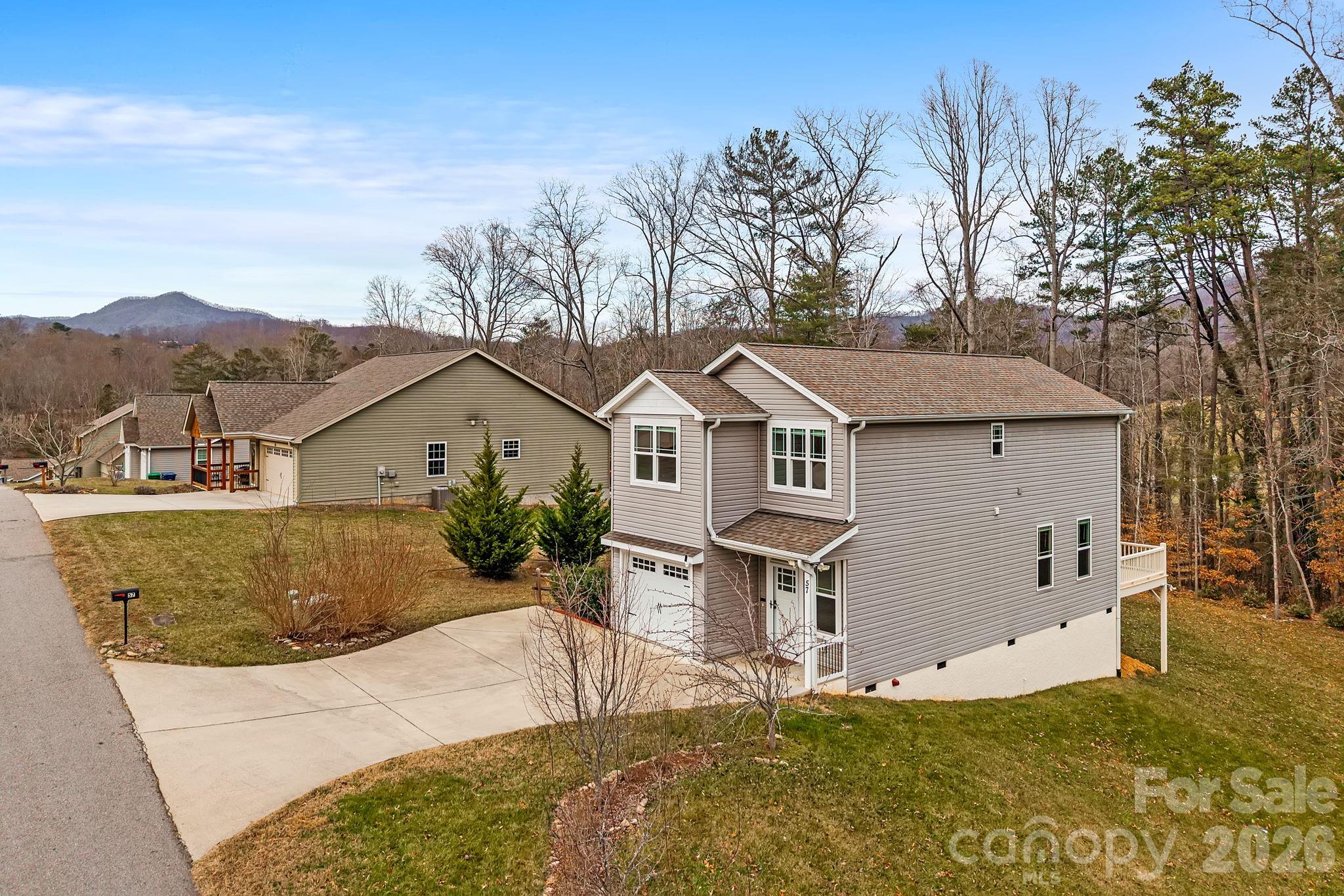 57 Parrot Road Candler, NC 28715 - Photo 2 of 44 a view of a house with a yard