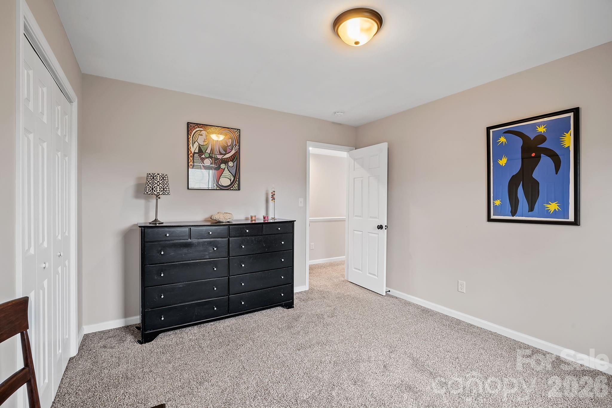 57 Parrot Road Candler, NC 28715 - Photo 28 of 44 a view of room with window and cabinet