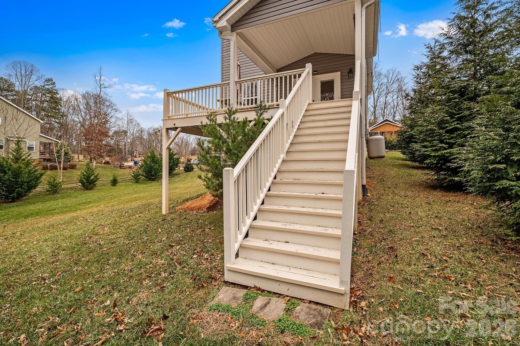 57 Parrot Road Candler, NC 28715 - Photo 34 of 44 a view of a house with a yard