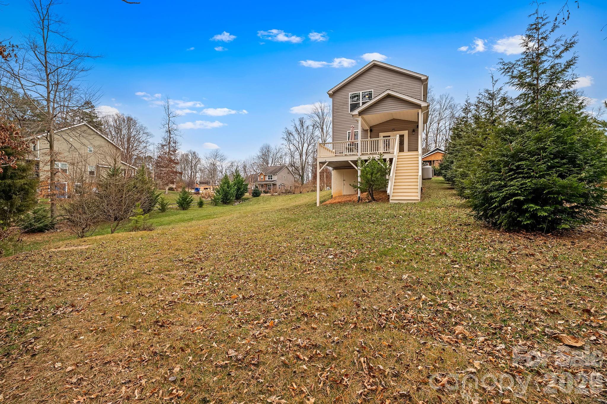 57 Parrot Road Candler, NC 28715 - Photo 35 of 44 a front view of a house with a yard