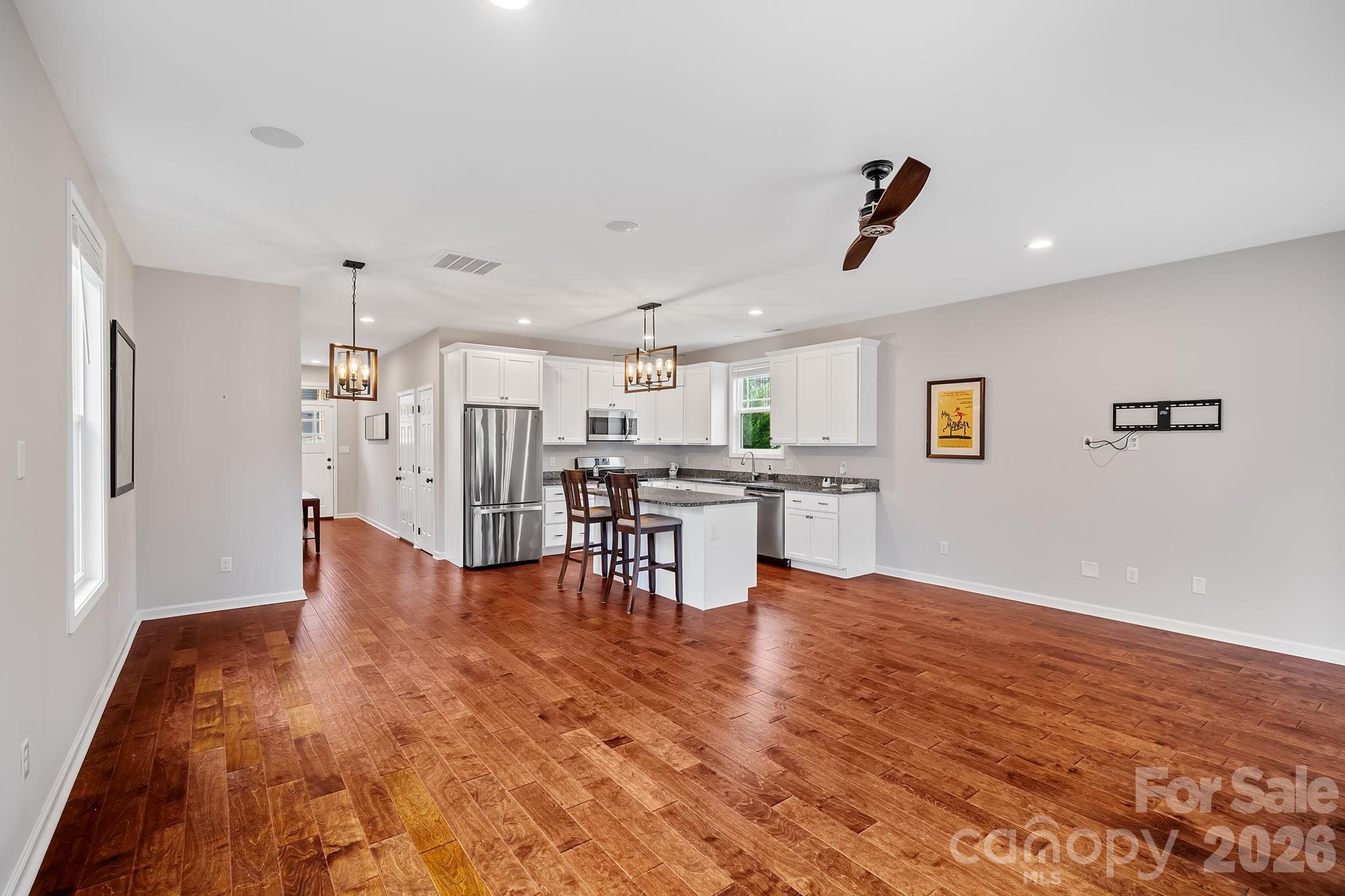 57 Parrot Road Candler, NC 28715 - Photo 4 of 44 a view of kitchen with furniture and wooden floor