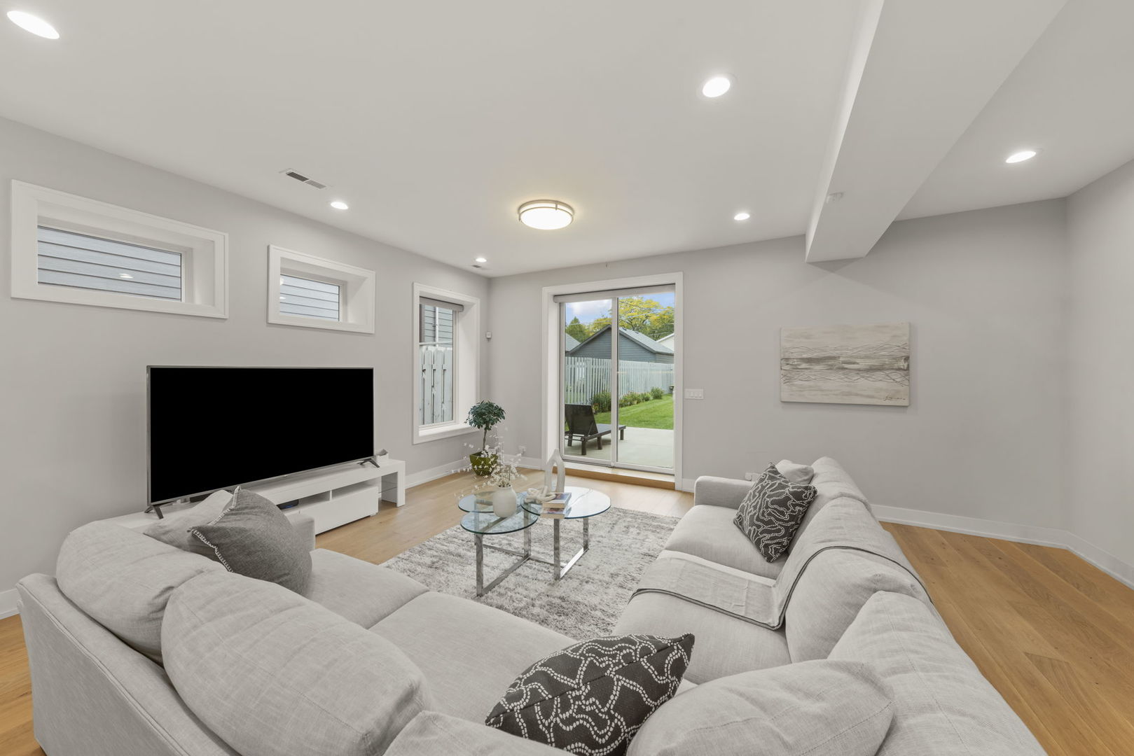 1126 Pitner Avenue Evanston, IL 60202 - Photo 11 of 48 a living room with furniture and a flat screen tv