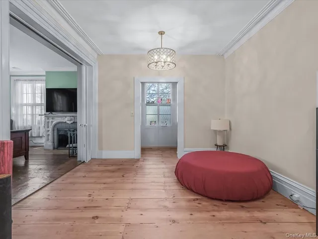 a bed room with a bed and a book shelf