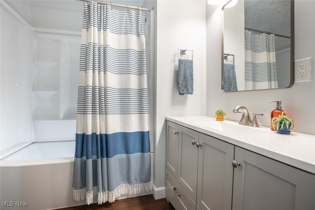 3434 Hamlin Road Medina, OH 44256 - Photo 25 of 37 Bathroom with hardwood / wood-style floors and vanity