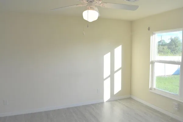 a view of a room that has a window