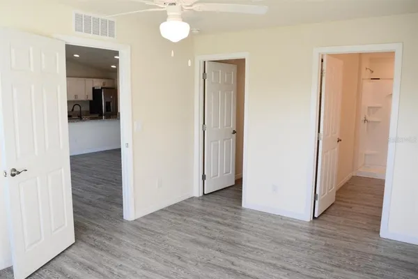 an empty room and wooden floor