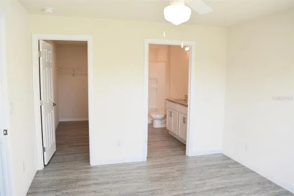 a view of a bathroom from a hallway