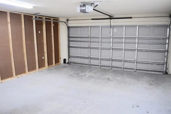 a view of a garage with shelf