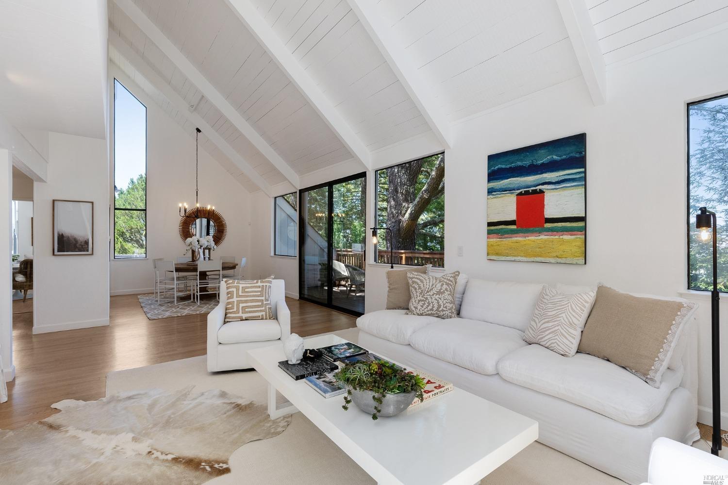 411 County View Drive Mill Valley, CA 94941 - Photo 1 of 1 a living room with furniture large windows and wooden floor