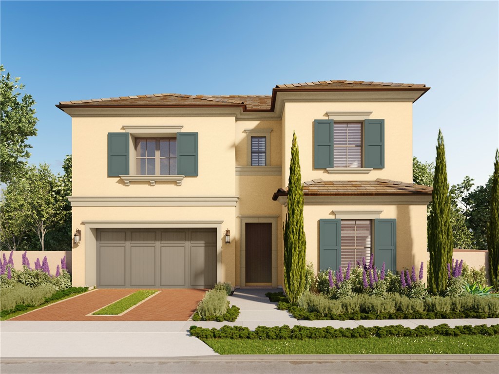 114 Hyperion, Unit 19 Irvine, CA 92618 - Photo 1 of 1 a view of a house with brick walls and a yard with plants