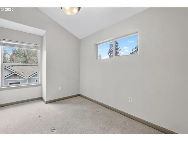 a bathroom with a granite countertop sink toilet a large mirror a shower and bathtub