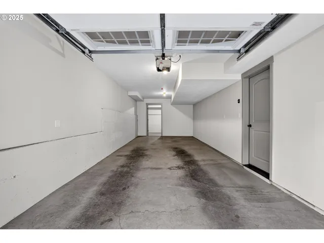 a porch with a bench next to a yard