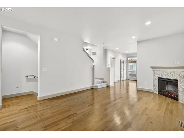a living room with a fireplace