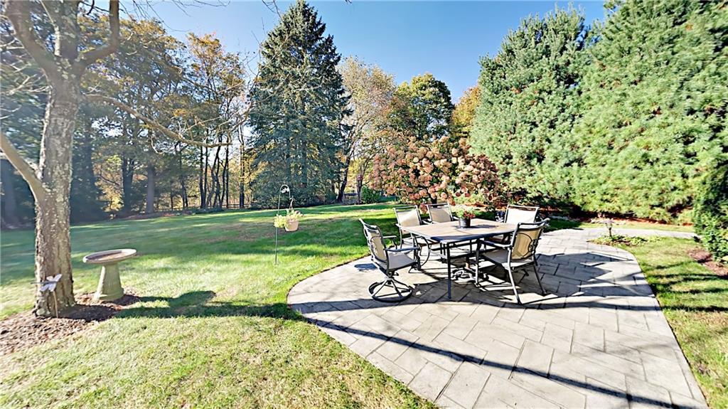 2567 Cole Road Wexford, PA 15090 - Photo 22 of 25 Stamped concrete patio and gorgeous hydrangea tree.