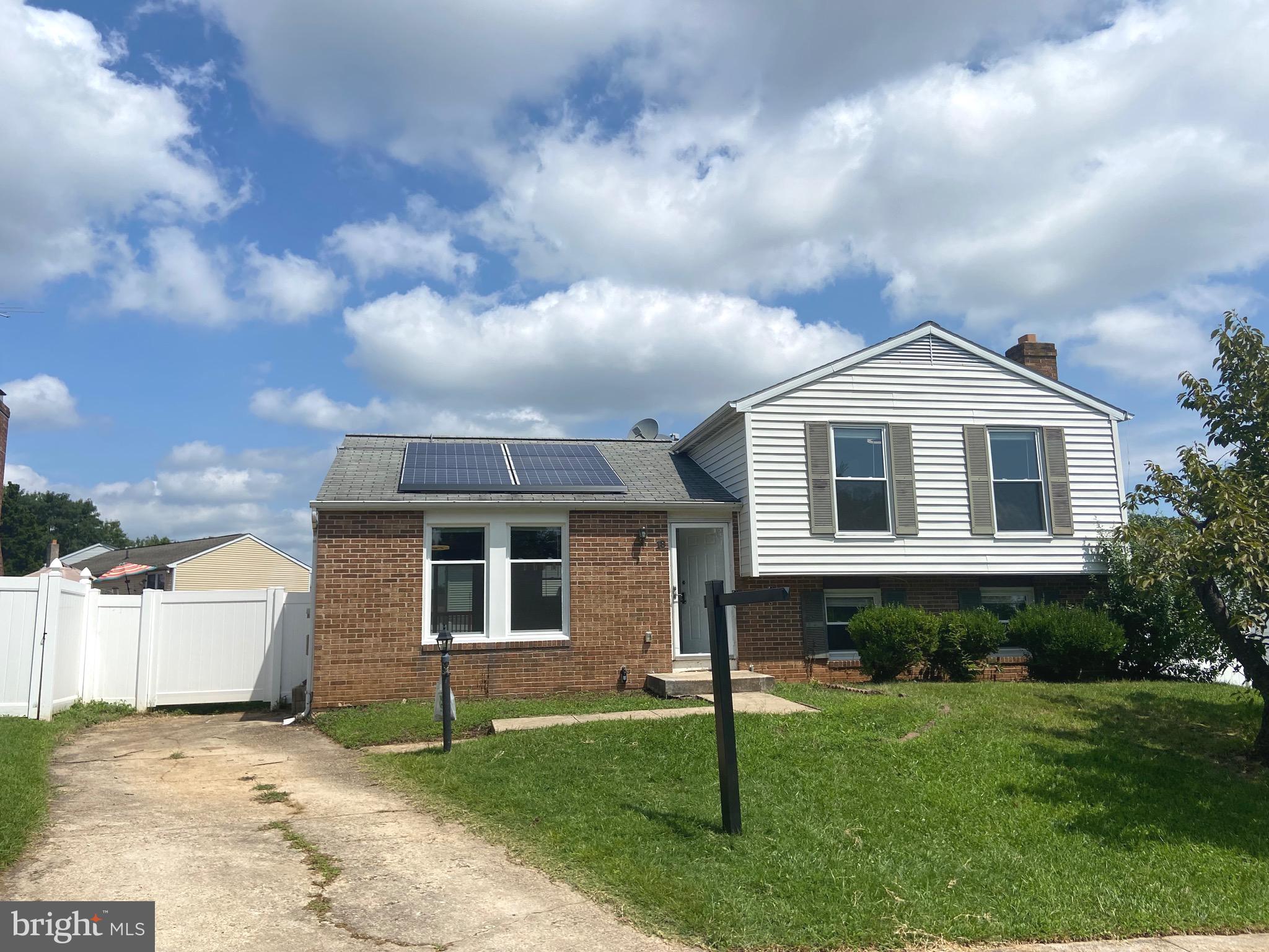 18 1st Light Court Rosedale, MD 21237 - Photo 1 of 29 a front view of a house with a garden