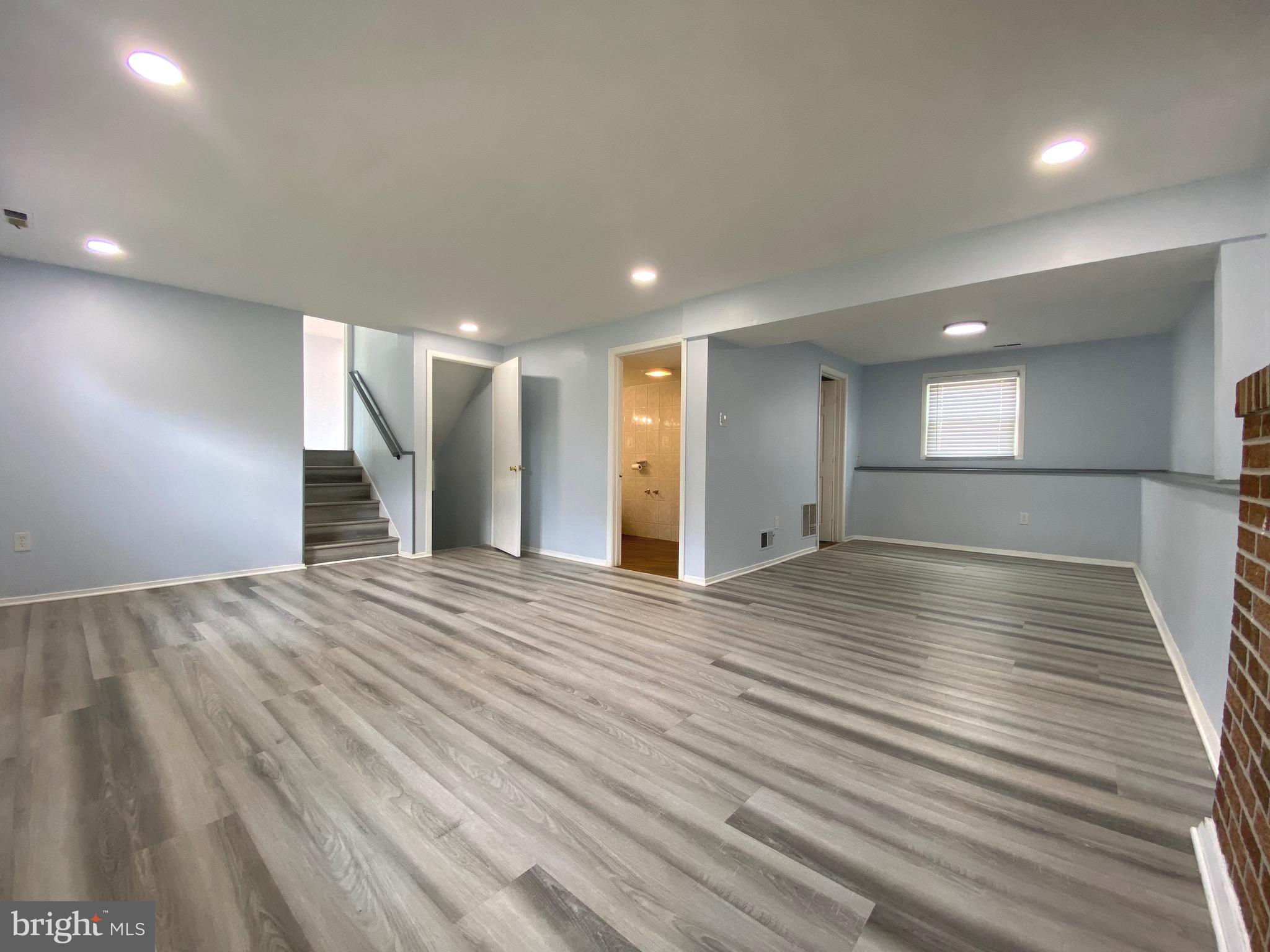 18 1st Light Court Rosedale, MD 21237 - Photo 16 of 29 a view of empty room with wooden floor