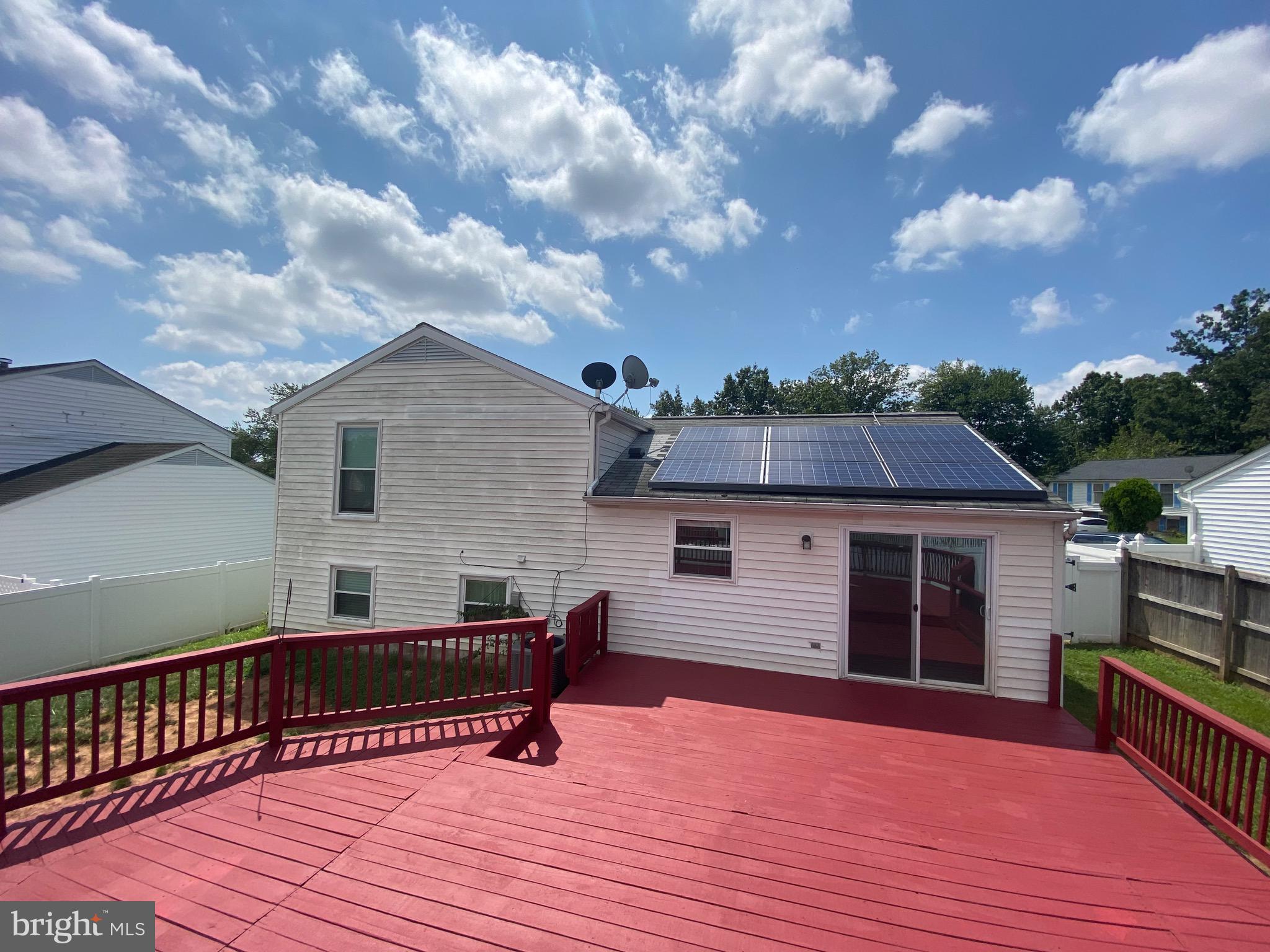 18 1st Light Court Rosedale, MD 21237 - Photo 26 of 29 a terrace of a house with wooden floor and fence