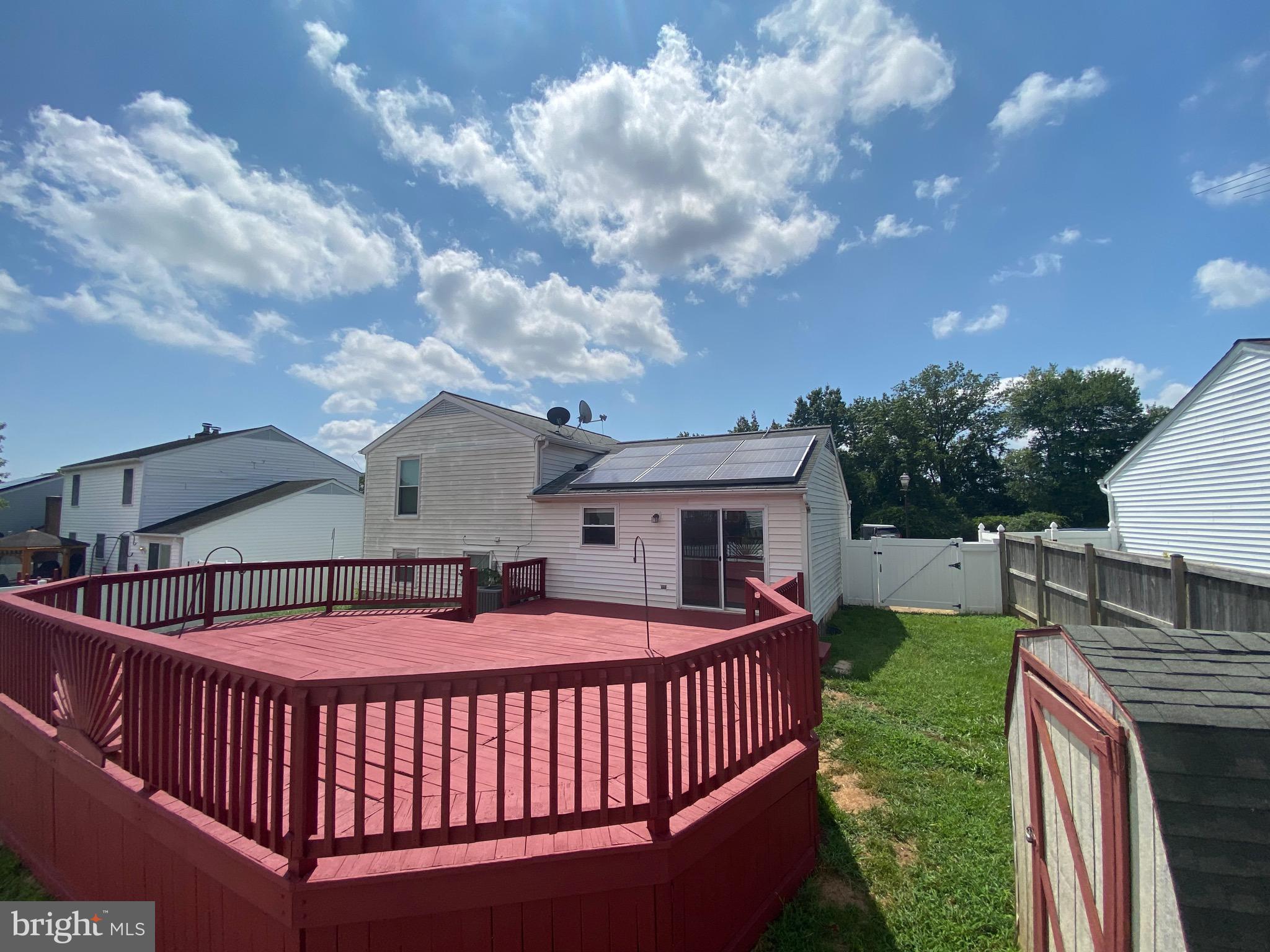 18 1st Light Court Rosedale, MD 21237 - Photo 28 of 29 a view of a house with a yard and deck