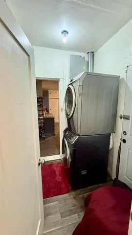 a room with furniture and a mirror