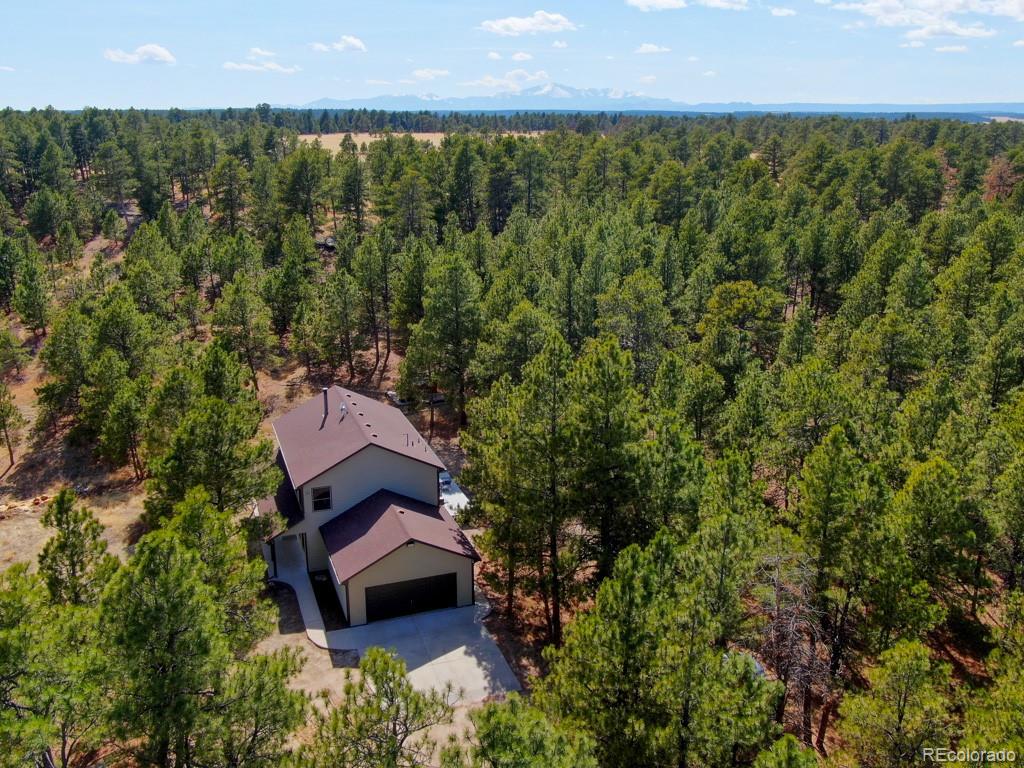 18673 North Elbert Road Elbert, CO 80106 - Photo 7 of 50 an aerial view of a house with a garden