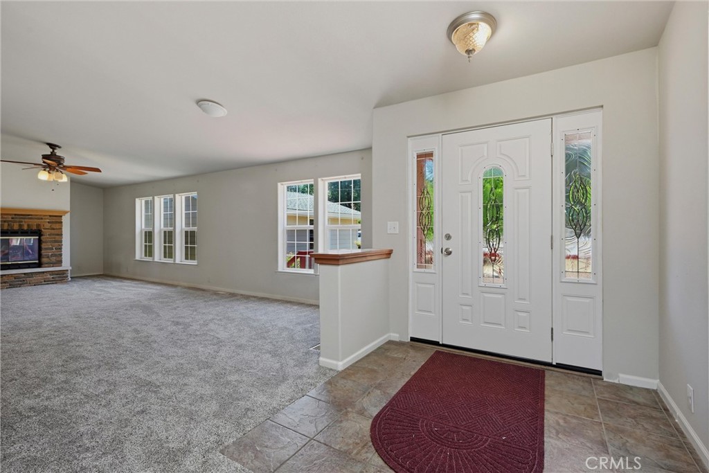 2860 Spring Valley Road Clearlake Oaks, CA 95423 - Photo 4 of 38 wooden floor and windows in a room