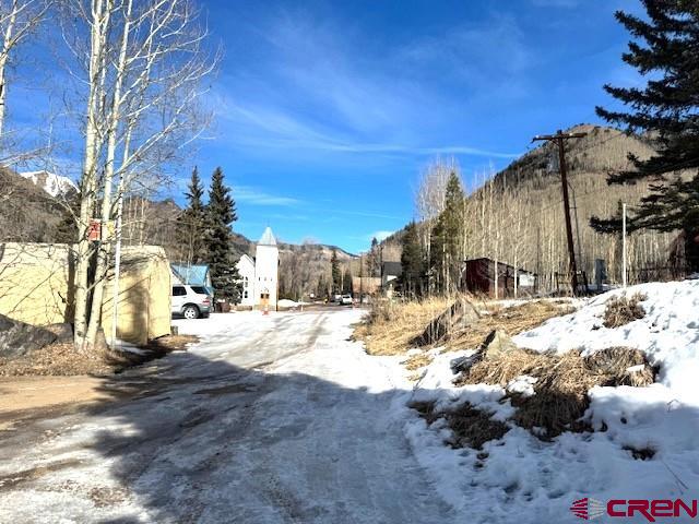15 South Silver Street Rico, CO 81332 - Photo 11 of 15 a view of a yard with snow on the road