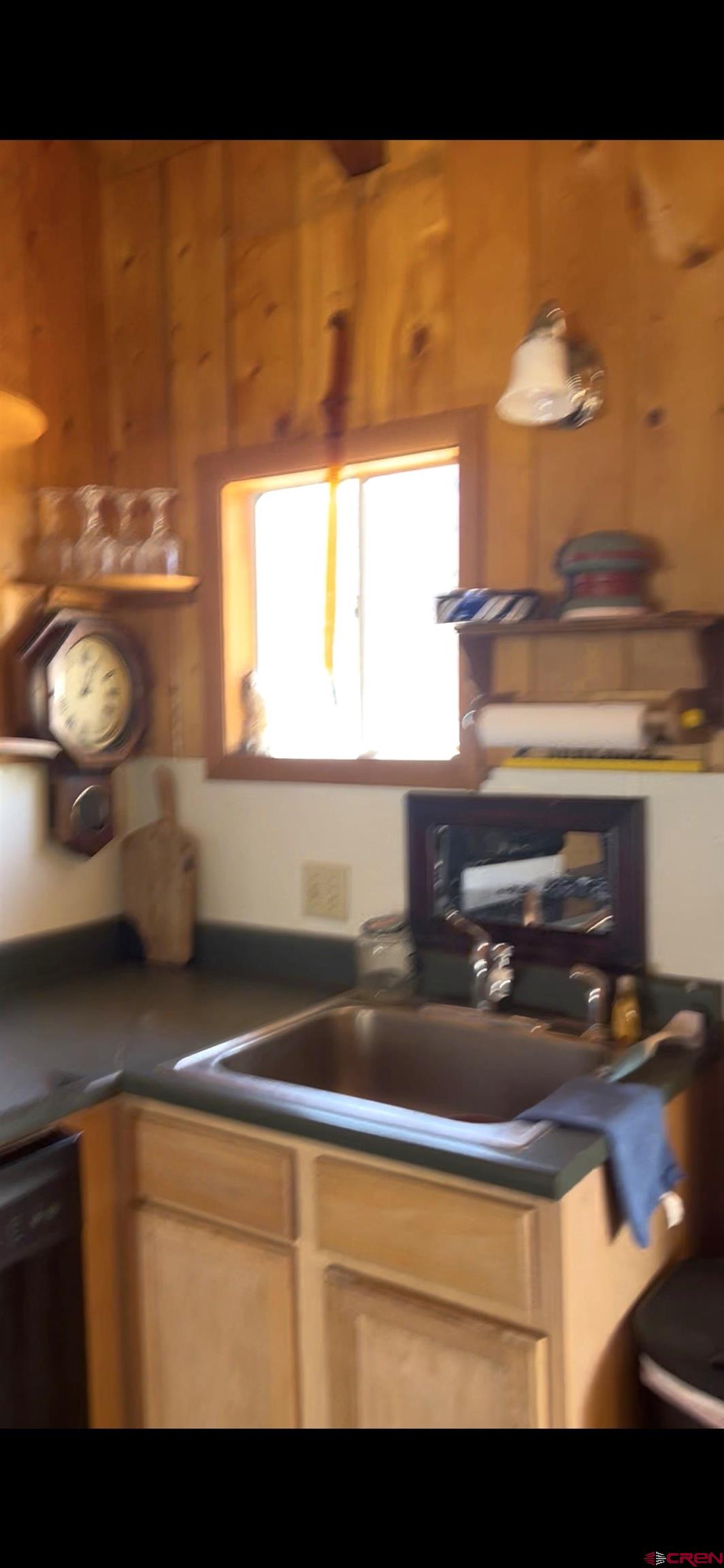 15 South Silver Street Rico, CO 81332 - Photo 14 of 15 a bathroom with a sink and a mirror