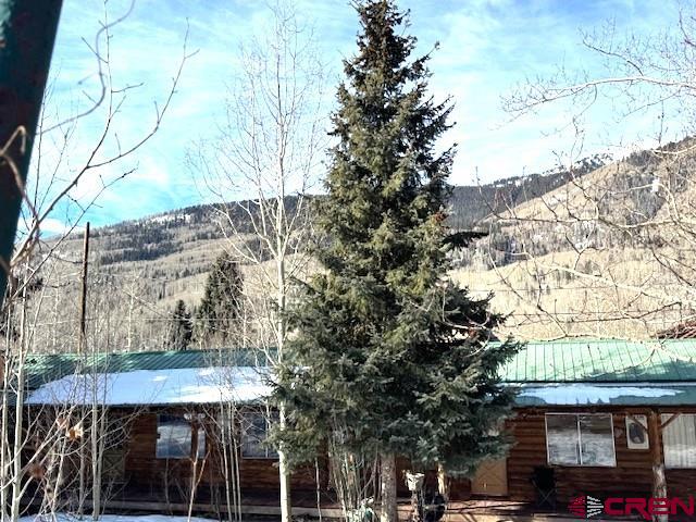 15 South Silver Street Rico, CO 81332 - Photo 5 of 15 a view of a house with a tree