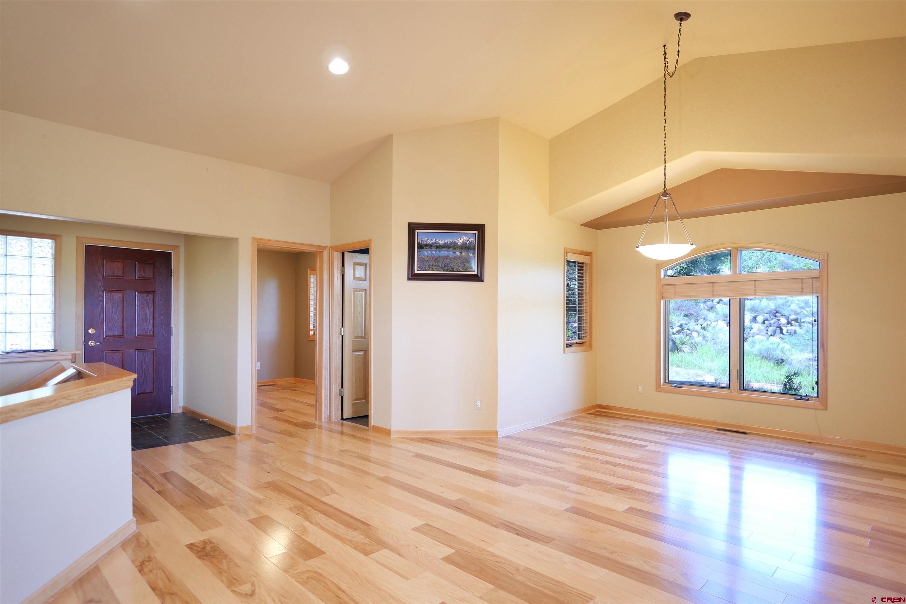 201 Woodchuck Place Ridgway, CO 81432 - Photo 11 of 33 a view of a room with window and wooden floor