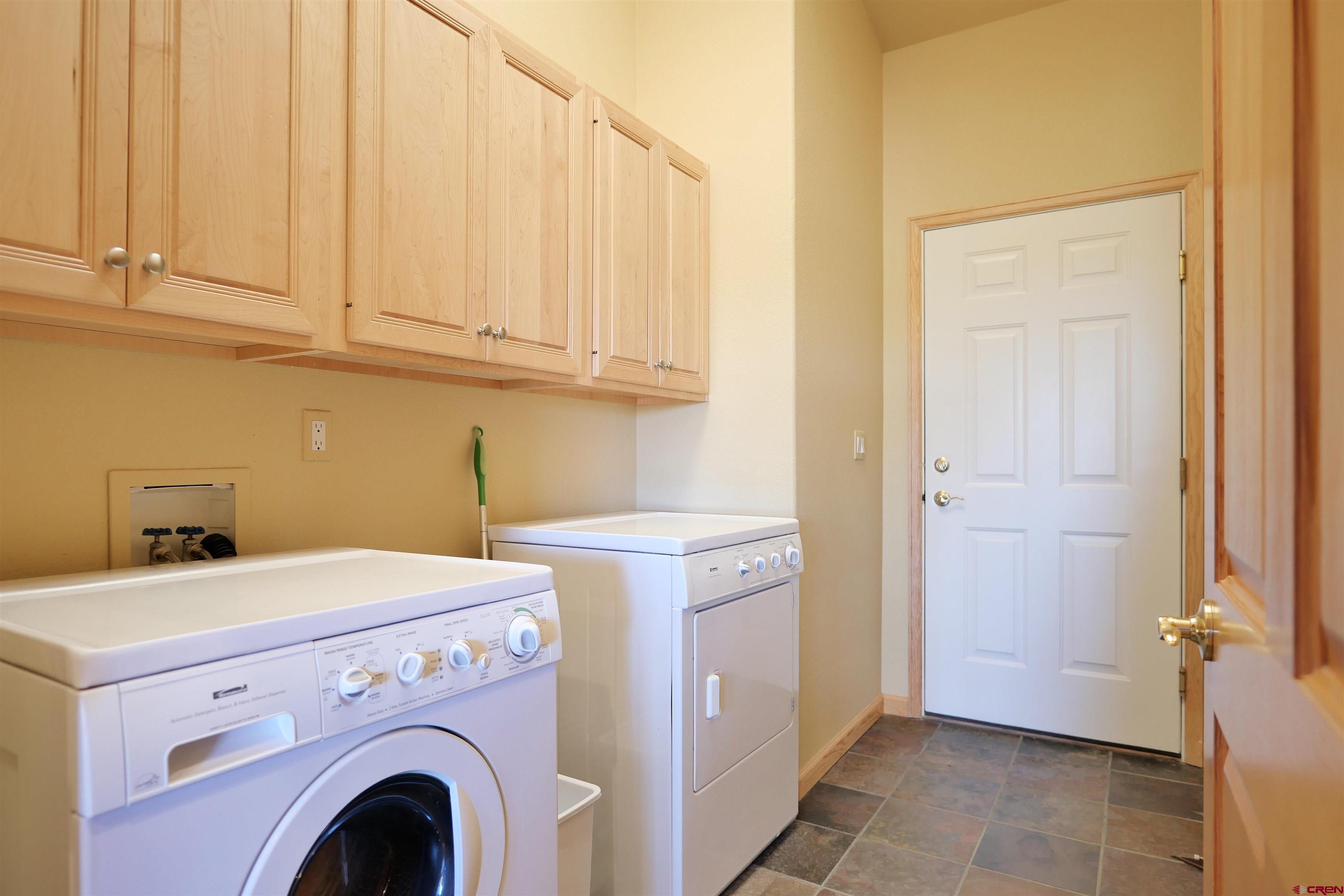 201 Woodchuck Place Ridgway, CO 81432 - Photo 21 of 33 a utility room with dryer and washer