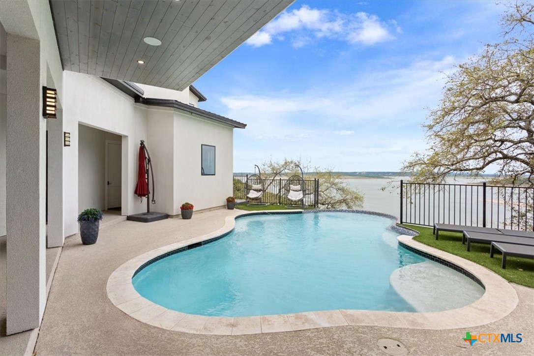 4802 Elf Trail Belton, TX 76513 - Photo 36 of 48 a view of a swimming pool with seating space