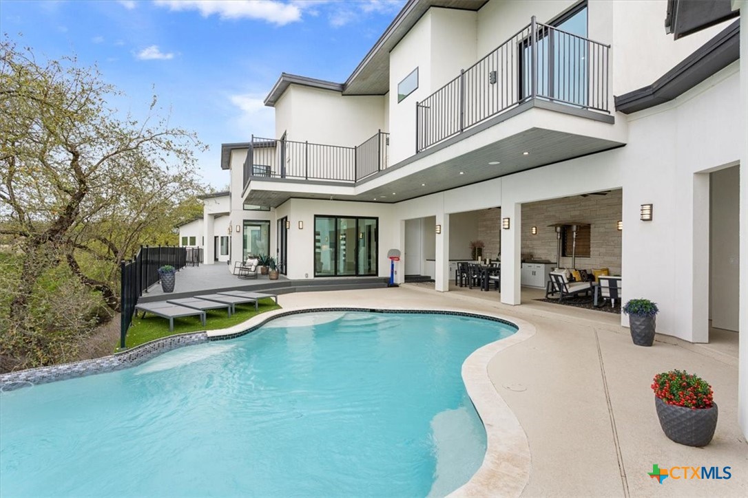 4802 Elf Trail Belton, TX 76513 - Photo 38 of 48 a view of a house with swimming pool and sitting area