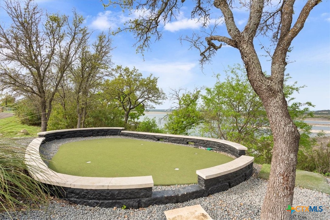 4802 Elf Trail Belton, TX 76513 - Photo 44 of 48 a view of a swimming pool with a yard