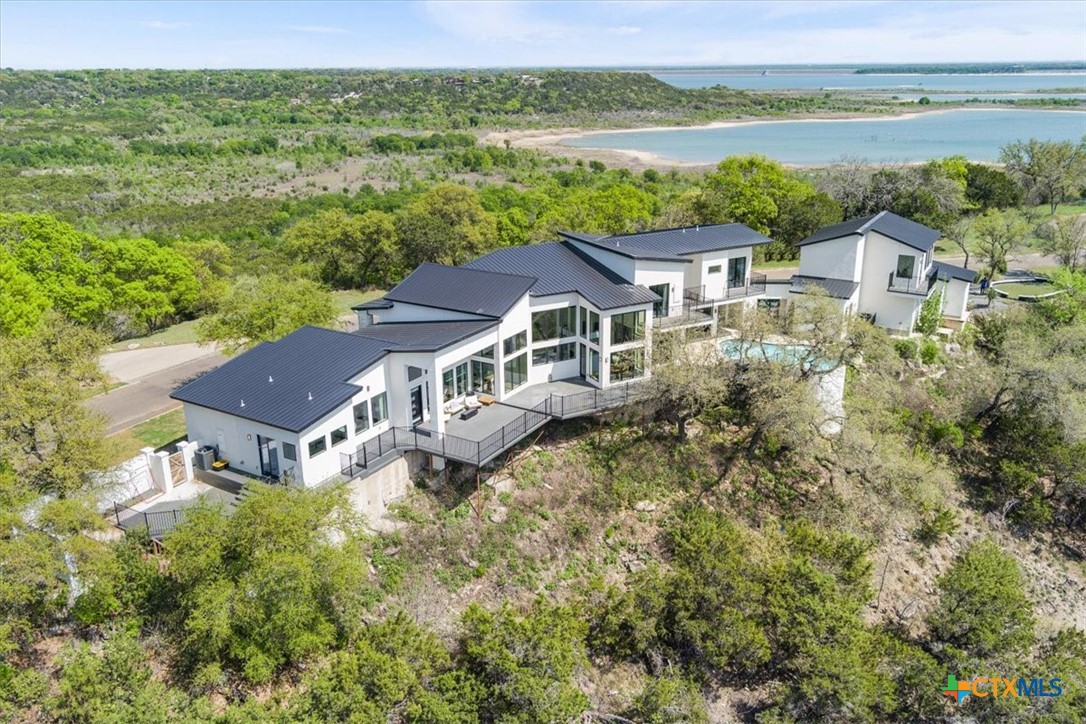 4802 Elf Trail Belton, TX 76513 - Photo 45 of 48 an aerial view of a house with outdoor space and a lake view