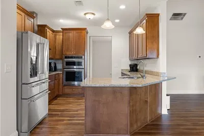 a view of a balcony with wooden floor