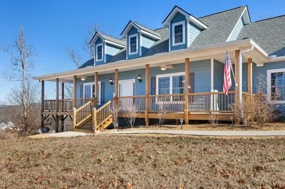 a view of a balcony with wooden floor